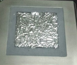 Liquid metal thermal paste on CPU of laptop